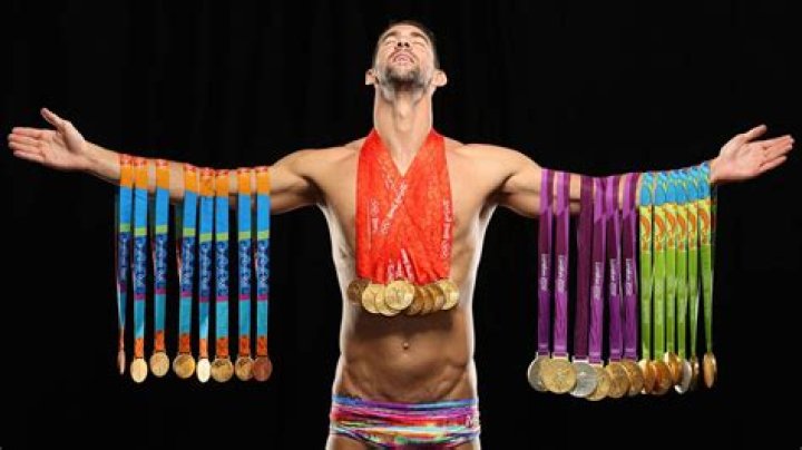 Michael Phelps Poses With All His Gold Medals